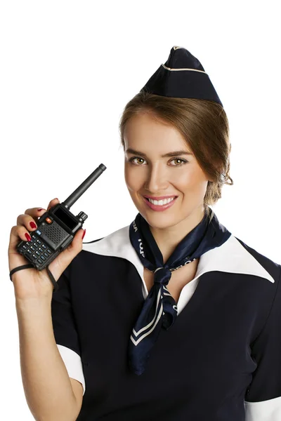 Mooie lachende stewardess met cb radio — Stockfoto