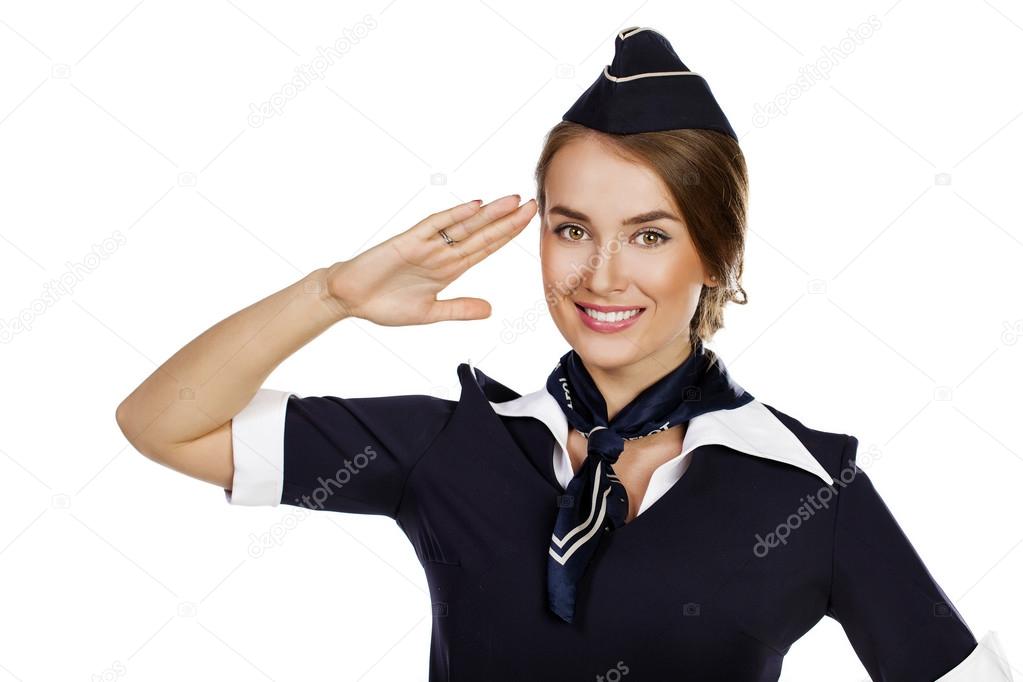 Beautiful smiling stewardess isolated on a white background