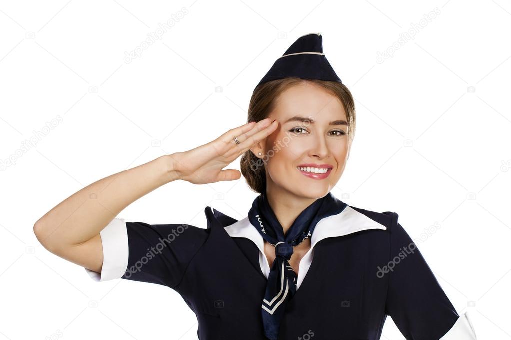 Beautiful smiling stewardess isolated on a white background