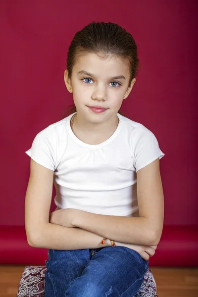 Portrait of a charming blonde little girl looking at camera — Stock Photo, Image