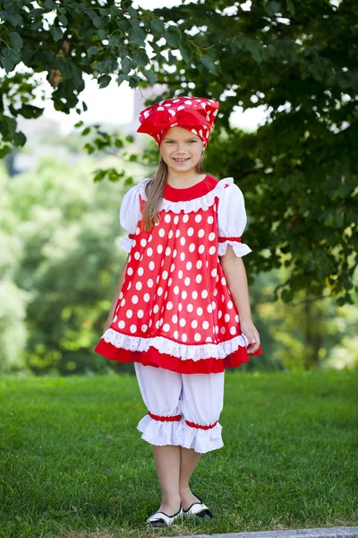 Portrait of a charming little girl looking at camera — Stock Photo, Image