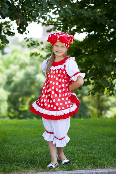 Portrait of a charming little girl looking at camera — Stock Photo, Image