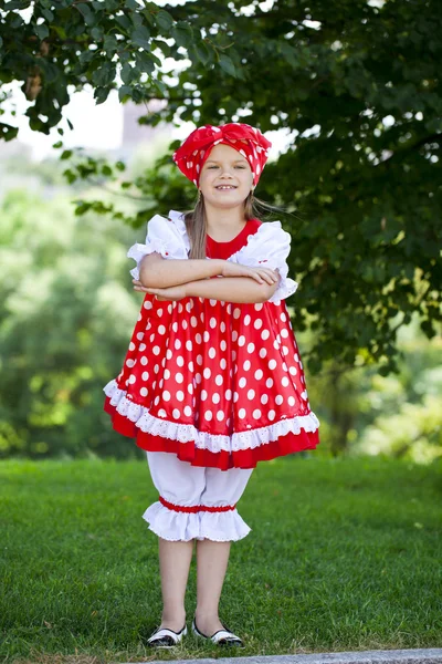 Portrait of a charming little girl looking at camera — Stock Photo, Image