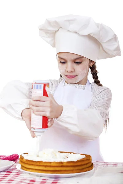 Cucina e concetto di persone - sorridente bambina in cappello cuoco — Foto Stock