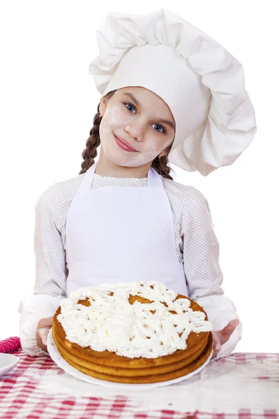 Kochen und Menschen-Konzept - lächelndes kleines Mädchen mit Kochmütze — Stockfoto