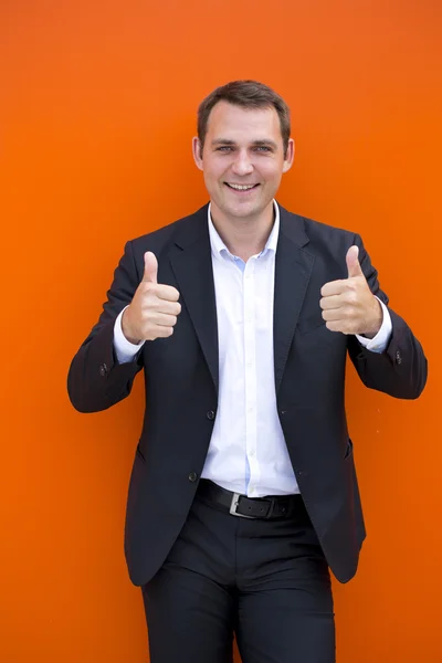 Portrait of a young business man in a dark suit and white shirt — Stock Photo, Image