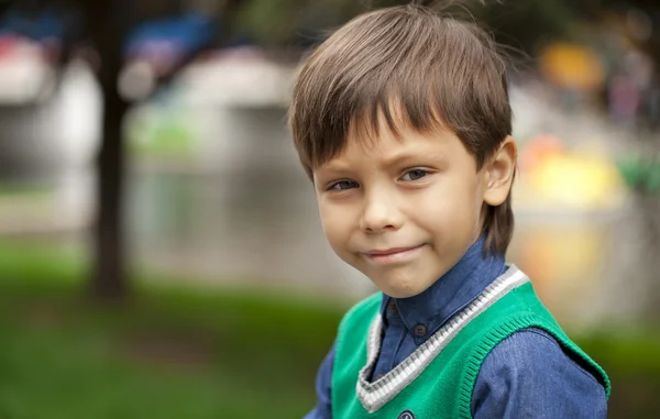 Fashionable little boy outdoor at the nice summer day — Stock Photo, Image