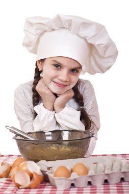 Beyaz bir önlük, küçük kız kalenin yumurta ile tatili.