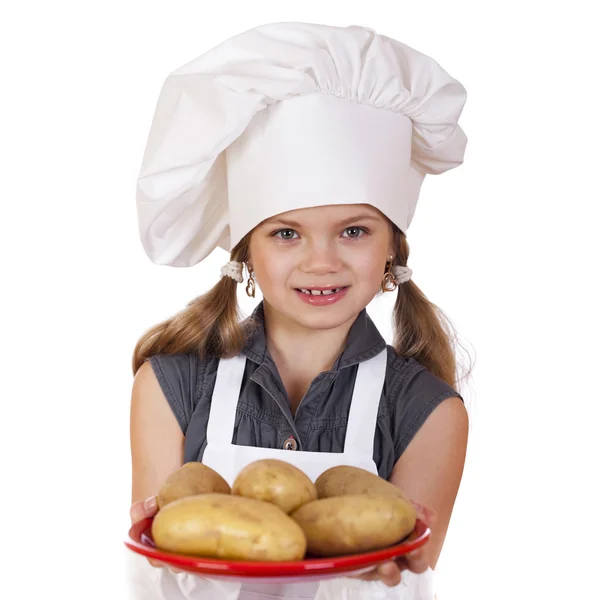 Cozinhar e conceito de pessoas - menina sorridente em chapéu de cozinheiro — Fotografia de Stock