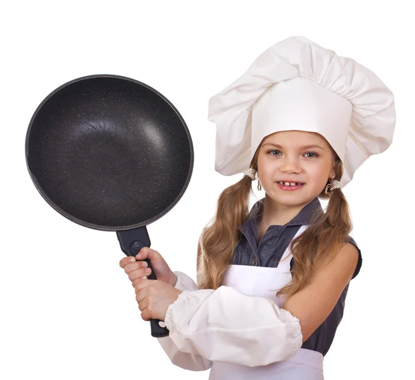 Smiling little girl in cook hat with frying pan — Stock Photo, Image