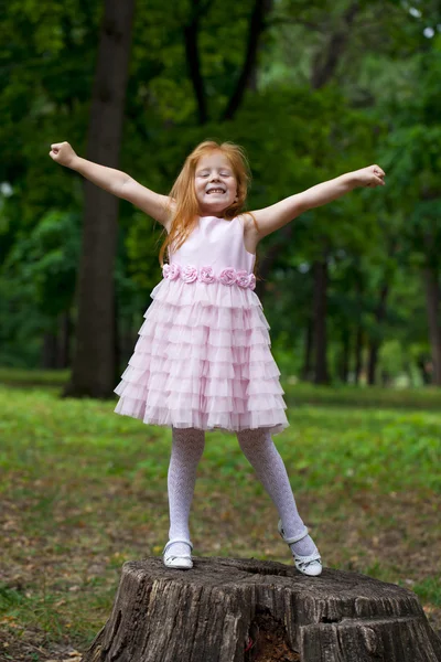 Full length portrait of little redheaded girl — Stock Photo, Image