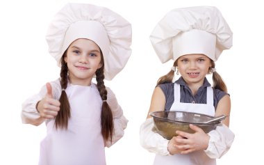 Yemek ve insanlar kavramı - iki küçük kız beyaz bir önlük 