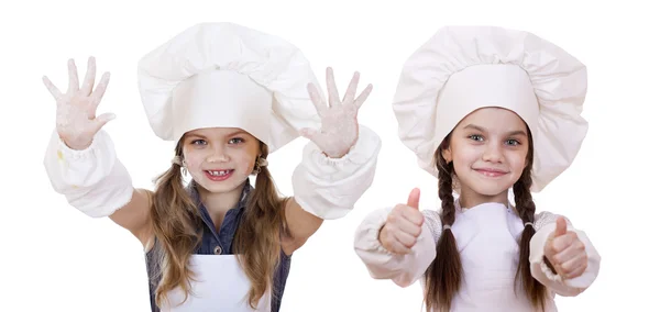 Cozinhar e conceito de pessoas - Duas meninas em um avental branco — Fotografia de Stock