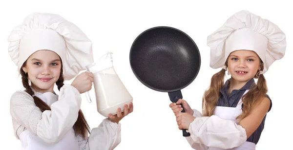 Cooking and people concept - Two Little girls in a white apron h — Stock Photo, Image