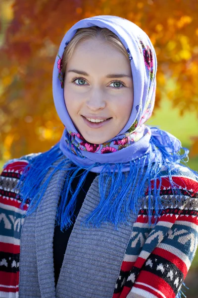 Beauty woman in the national patterned scarf — Stock Photo, Image