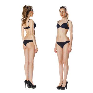 Portrait in full growth, two beautiful models in black lingerie,