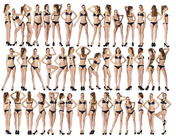 Full längd porträtt av en vacker ung modeller i svart bikini — Stockfoto