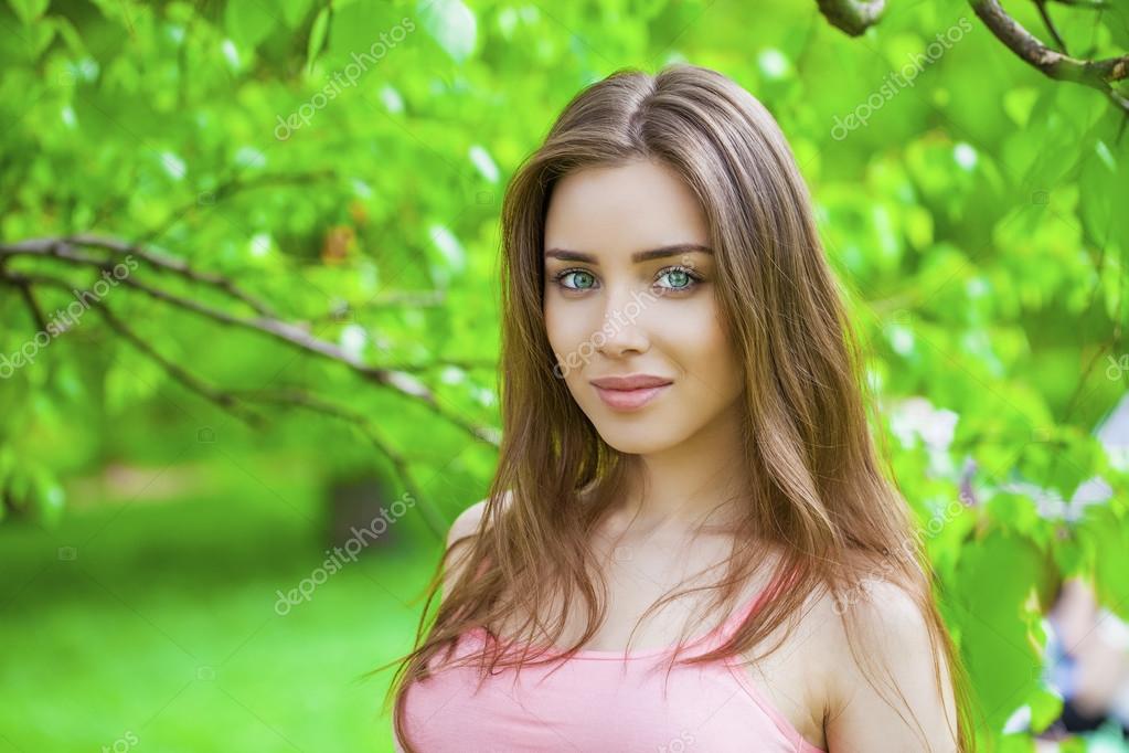 Russian beauty - Young brunette girl at a white birch Stock Photo by ...