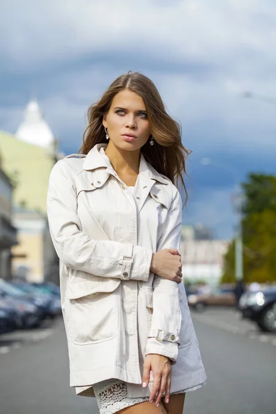 Young beautiful woman in white dress — Stock Photo, Image