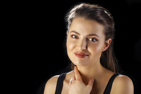 Beauty woman face closeup isolated on black background — Stock Photo, Image