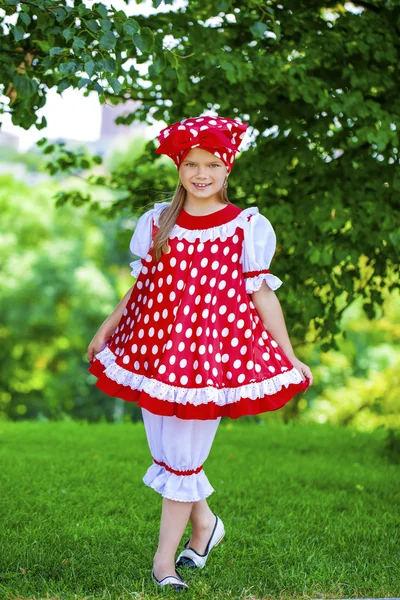 Portrait of a charming little girl looking at camera — Stock Photo, Image