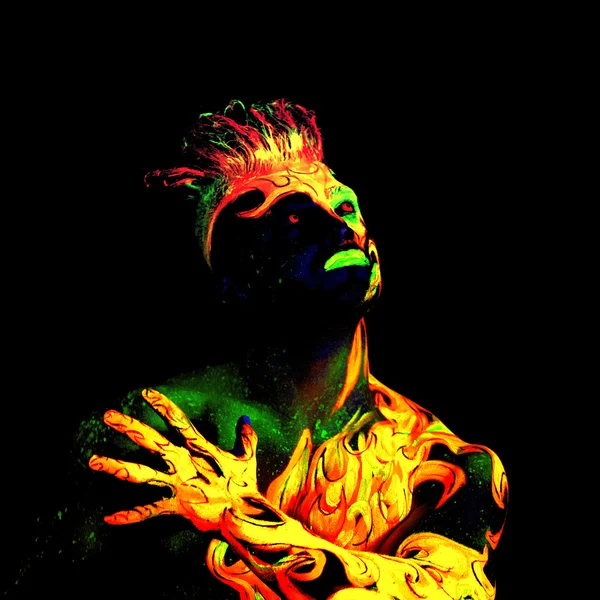 Body art glowing in ultraviolet light — Stock Photo, Image