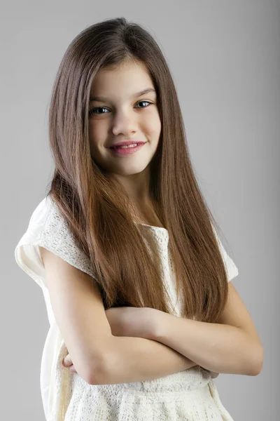 Portrait of a charming brunette little girl — Stock Photo, Image