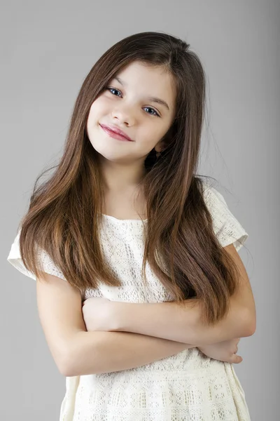 Portrait of a charming brunette little girl — Stock Photo, Image