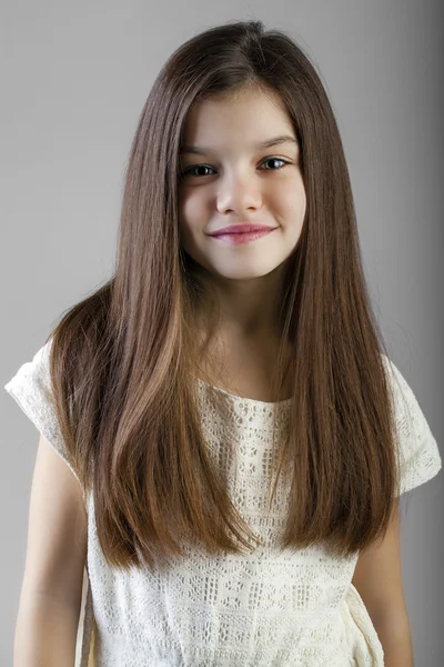 Portrait of a charming brunette little girl — Stock Photo, Image