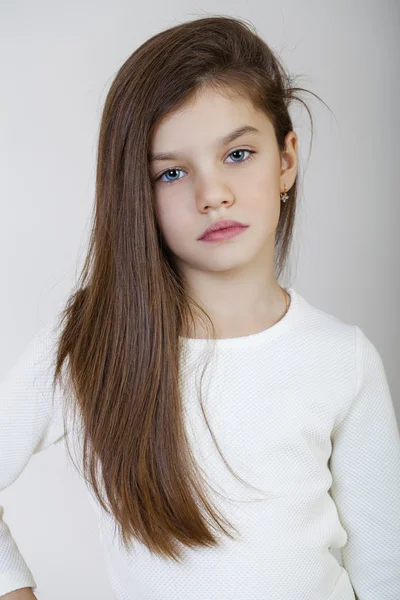 Portrait of a charming brunette little girl — Stock Photo, Image