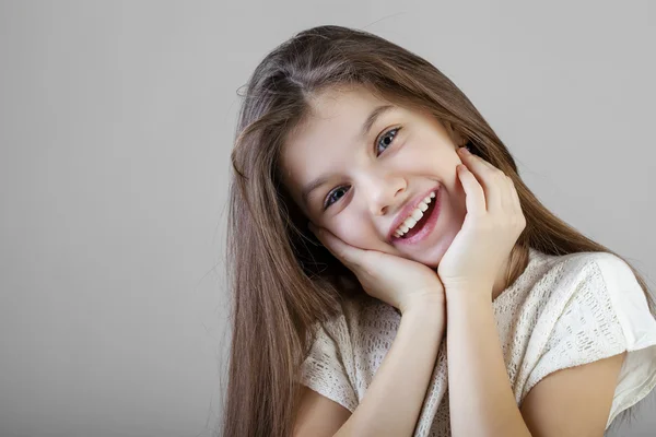 Portrait of a charming brunette little girl — Stock Photo, Image