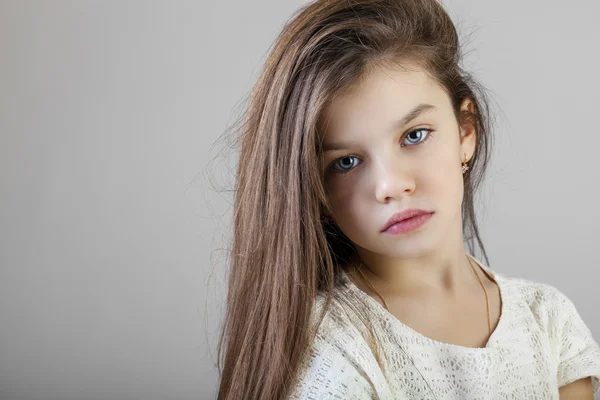 Portrait of a charming brunette little girl — Stock Photo, Image
