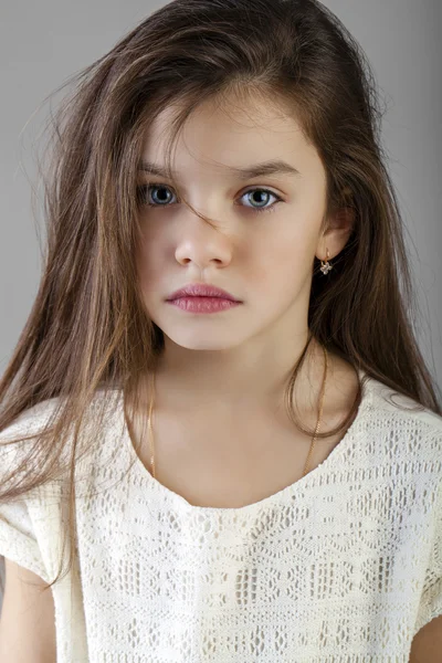 Portrait of a charming brunette little girl — Stock Photo, Image