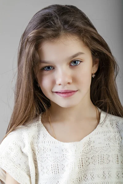 Portrait of a charming brunette little girl — Stock Photo, Image