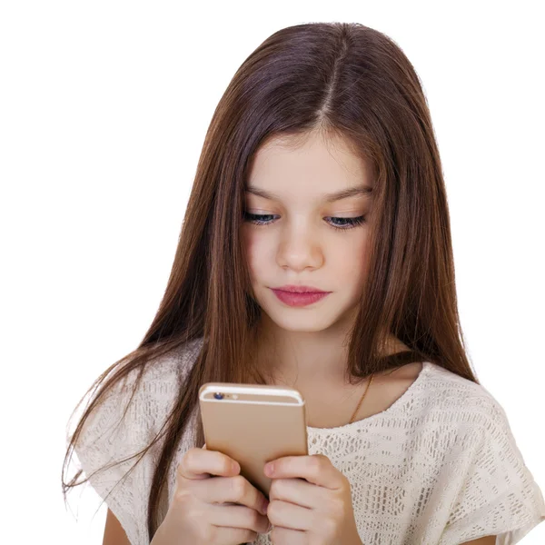 Portrait of brunette Caucasian schoolgirl with mobile phone — Stock Photo, Image