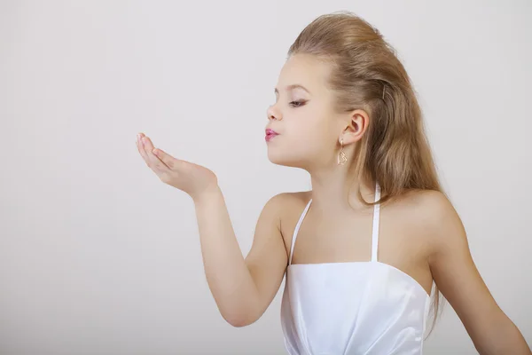 Portrait of a little girl in white classic dress — Stock Photo, Image