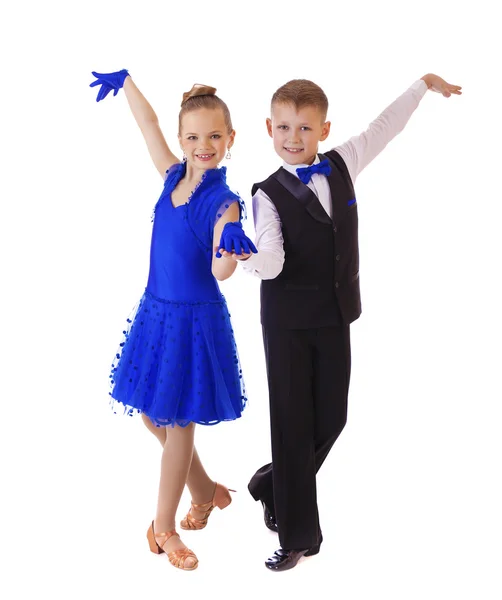 Szczęśliwa dziewczynka w niebieska sukienka taniec — Zdjęcie stockowe