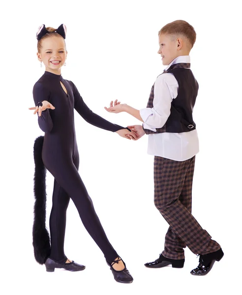 Dancing little girl dressed as a cat and a boy in a plaid vest — Stock Photo, Image