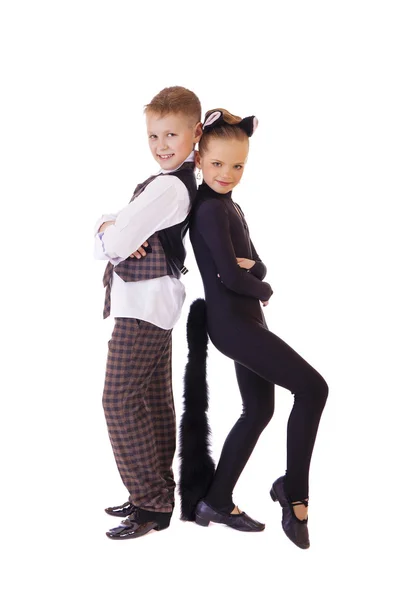 Dancing little girl dressed as a cat and a boy in a plaid vest — Stock Photo, Image