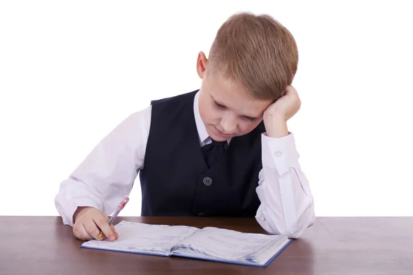 De tien-jarige middelbare schoolstudent vergadering op een bureau — Stockfoto