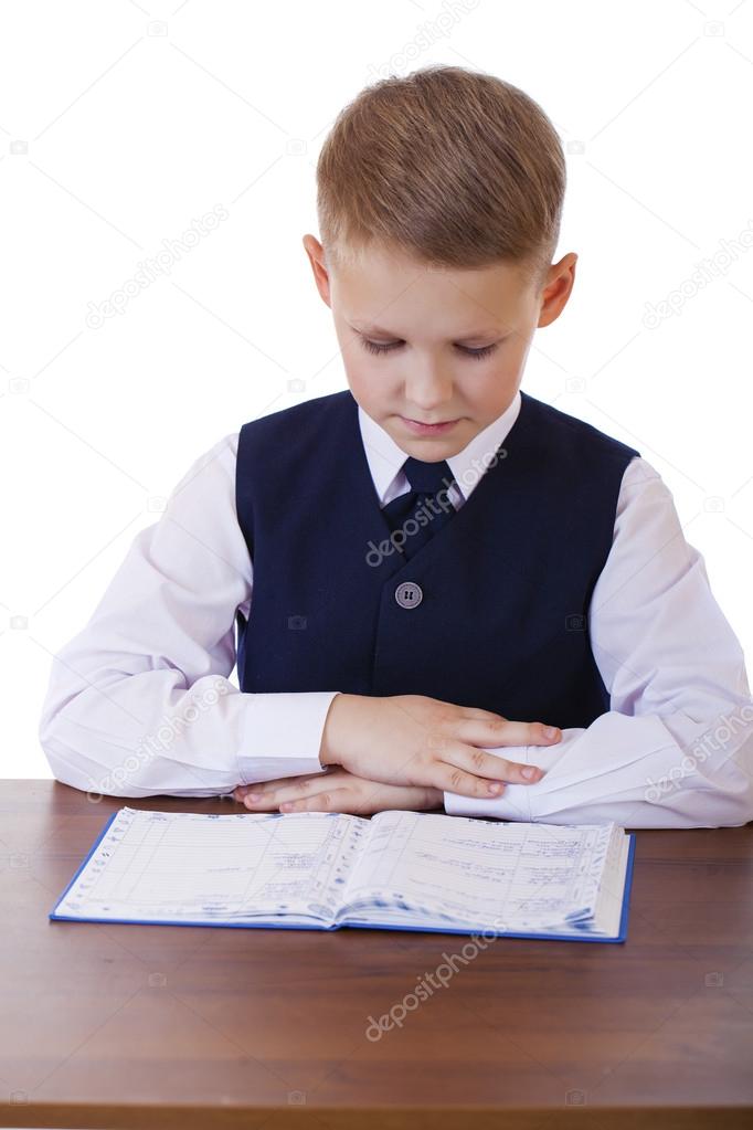 The Ten Year High School Student Sitting At A Desk Stock Photo