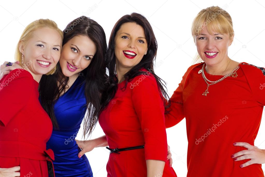 Group of four sexy, beautiful young happy women. Isolated on whi