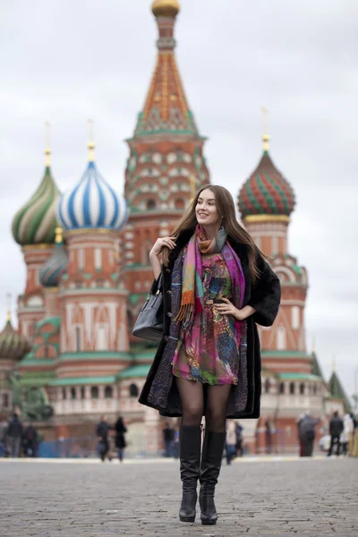 Young woman in a mink coat on the Red Square in Moscow Stock Picture