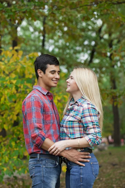 Portrait of attractive girl embracing her boyfriend — Stock Photo, Image