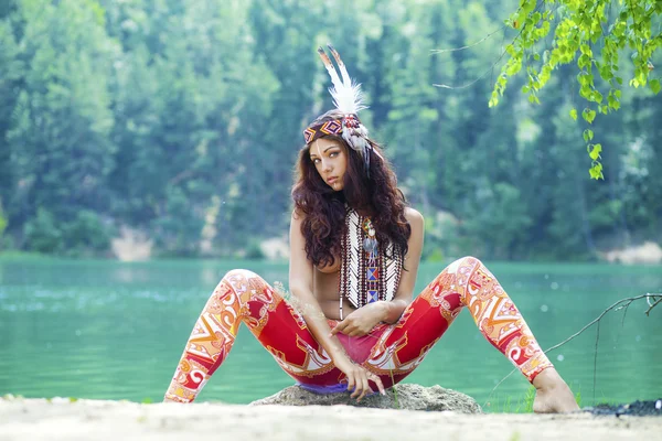 Young woman in costume of American Indian, outdoor — Stock Photo, Image