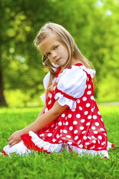 Portrait of a charming little girl looking at camera — Stok Foto