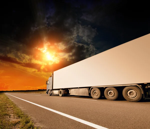 Truck on asphalt road motion blur — Stock Photo, Image