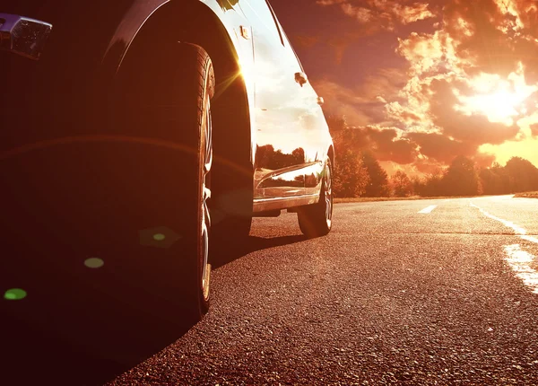 Black car driving fast — Stock Photo, Image