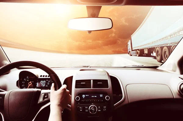 Driver hands on steering wheel — Stock Photo, Image