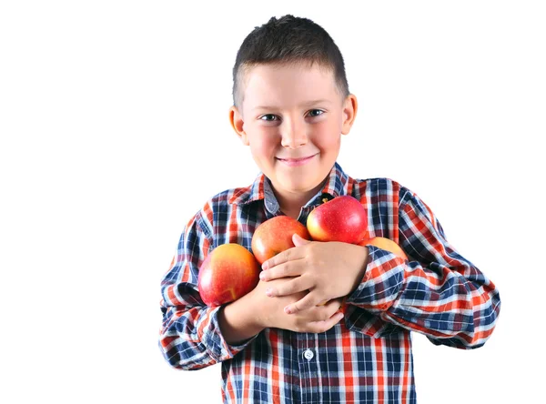 Liten pojke med äpplen — Stockfoto